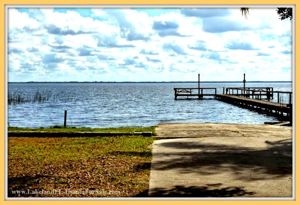 Love fishing? This home for sale with a pool in Lake Wales FL is adjacent to the best fishing lake in Polk county.